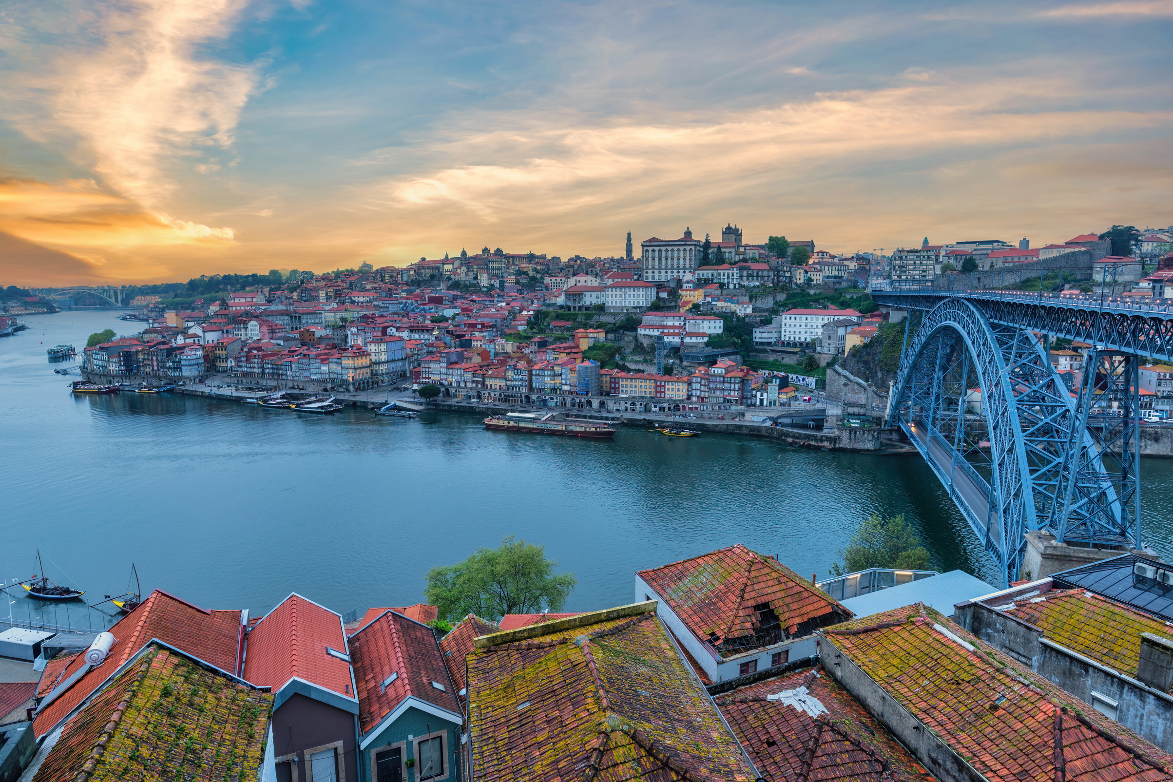 Porto Portugal, sunrise city skyline at Porto Ribeira with Douro River and Dom Luis I Bridge